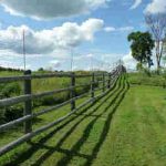 wooden fencing with ultra deer fence 300 plus behind it